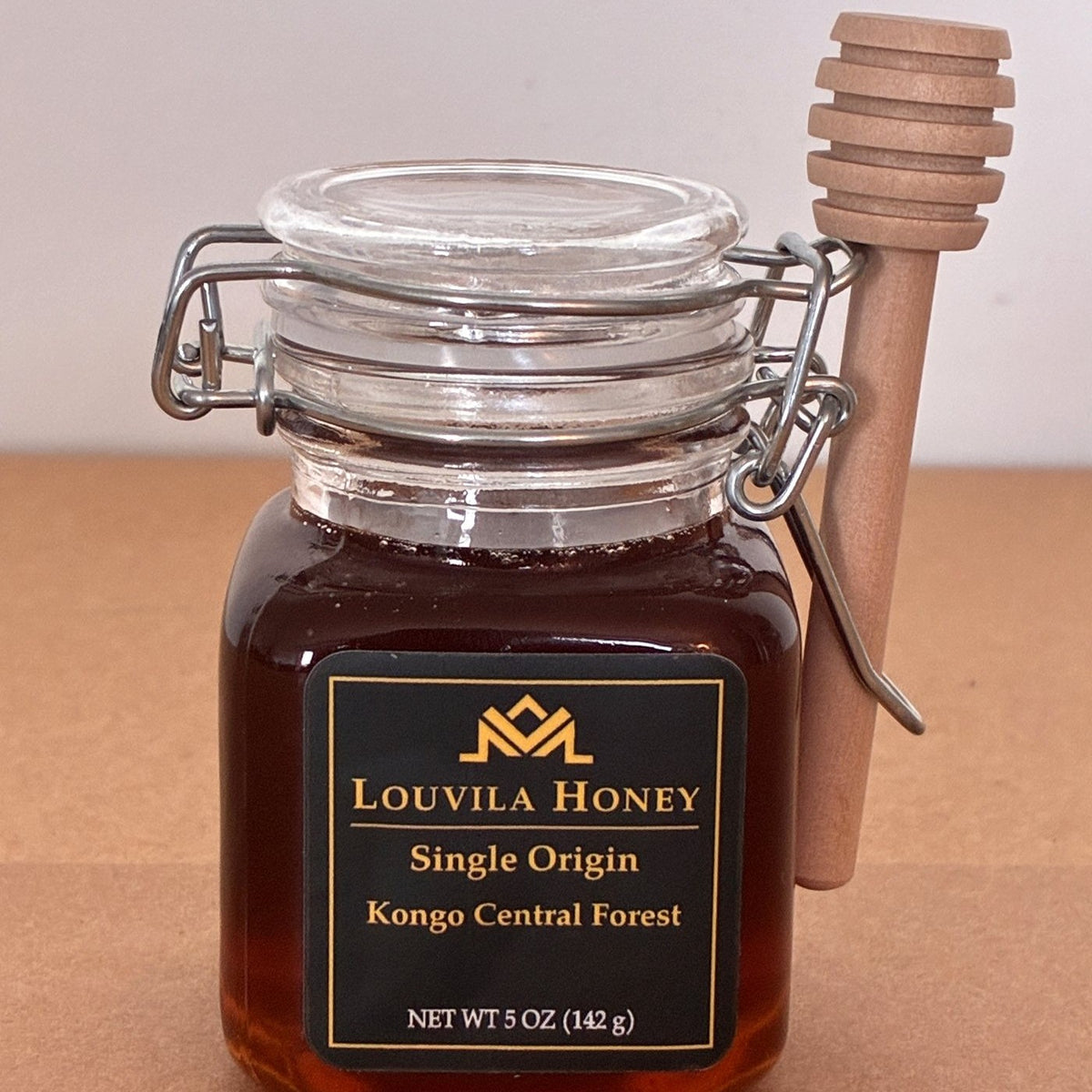 Louvila Honey, the jar with its wooden dipper